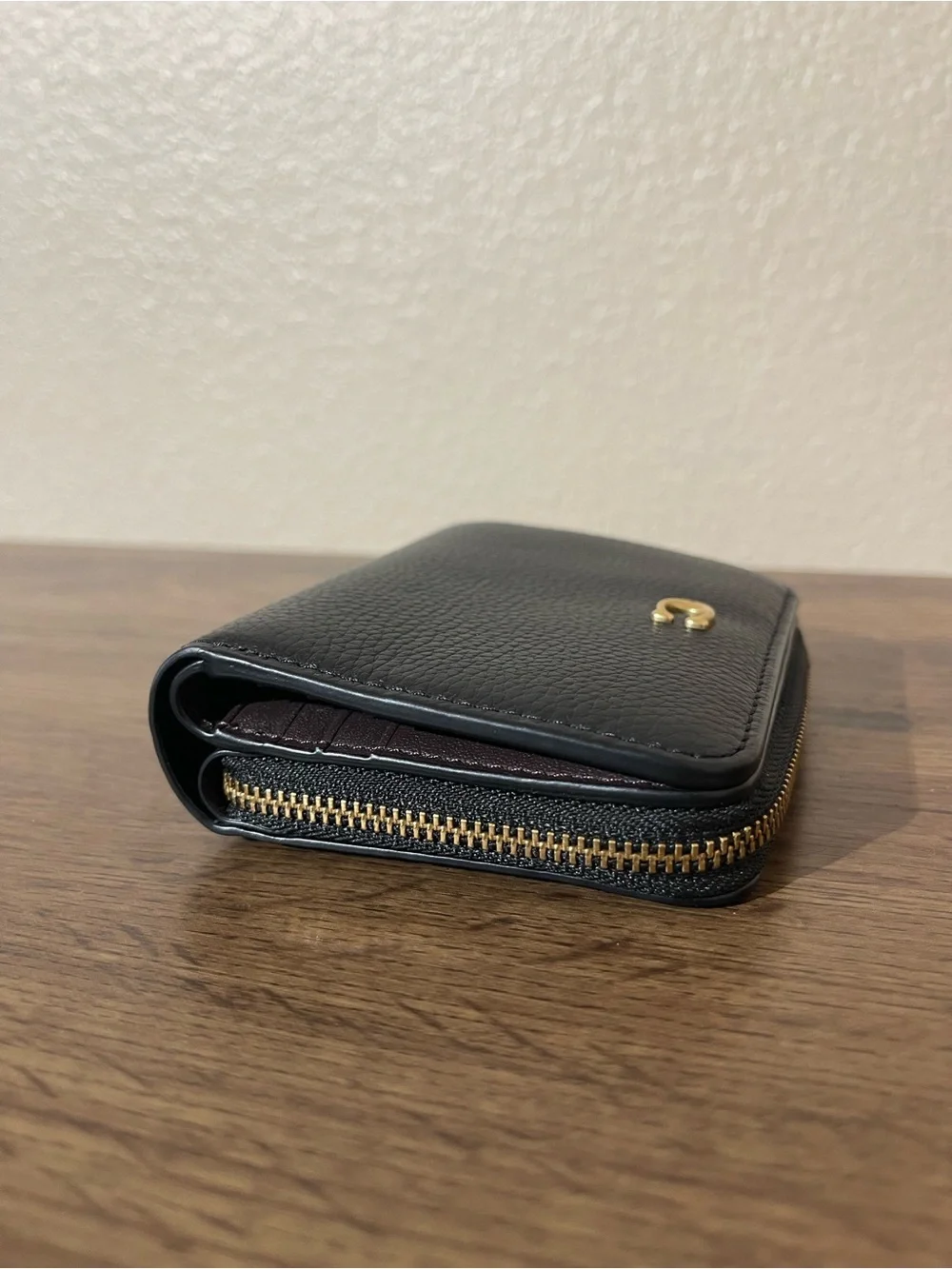 Coach Black Leather Zip-Around Wallet with Gold Hardware